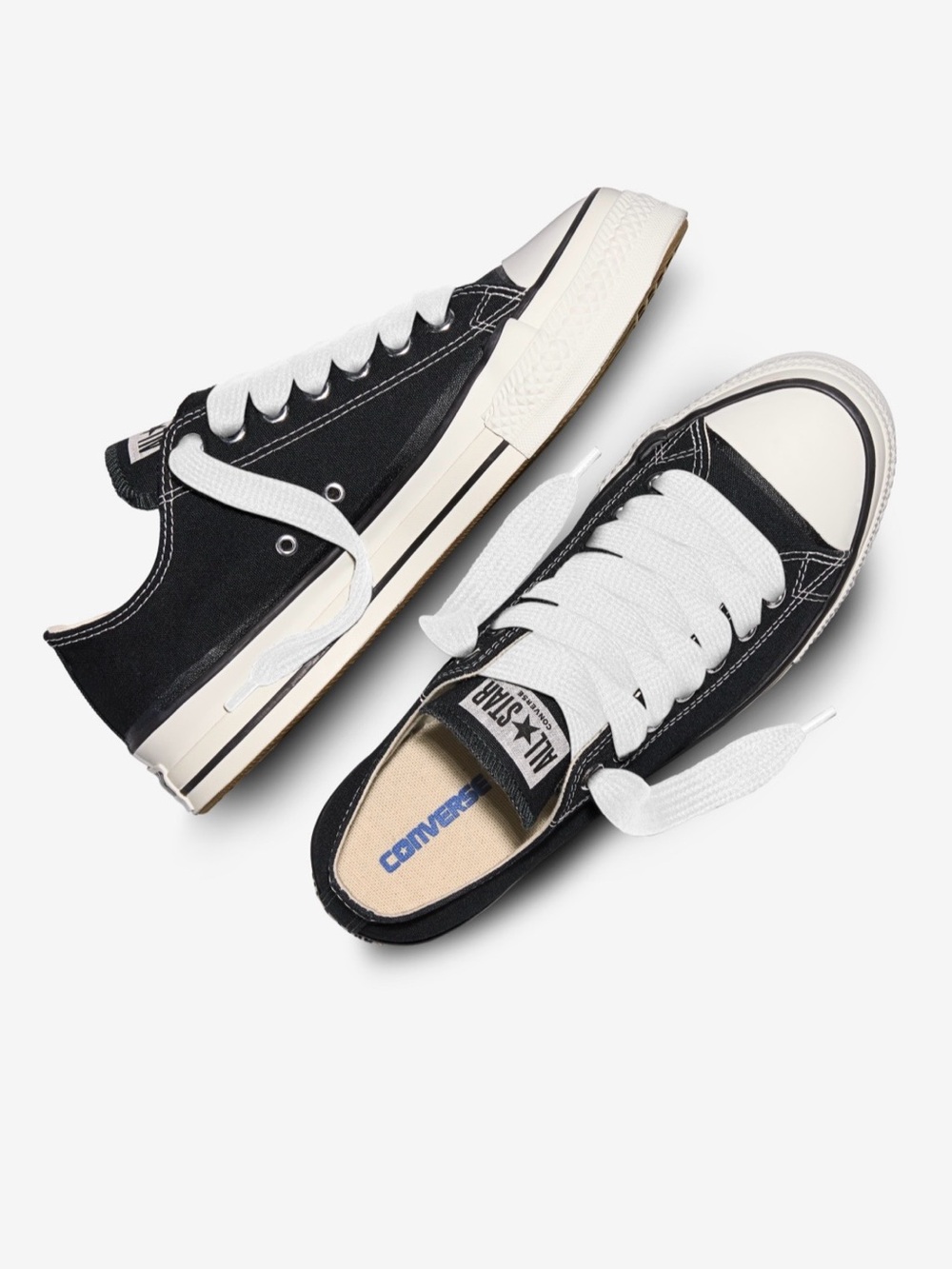 Converse Low Top Sneakers in Black and White